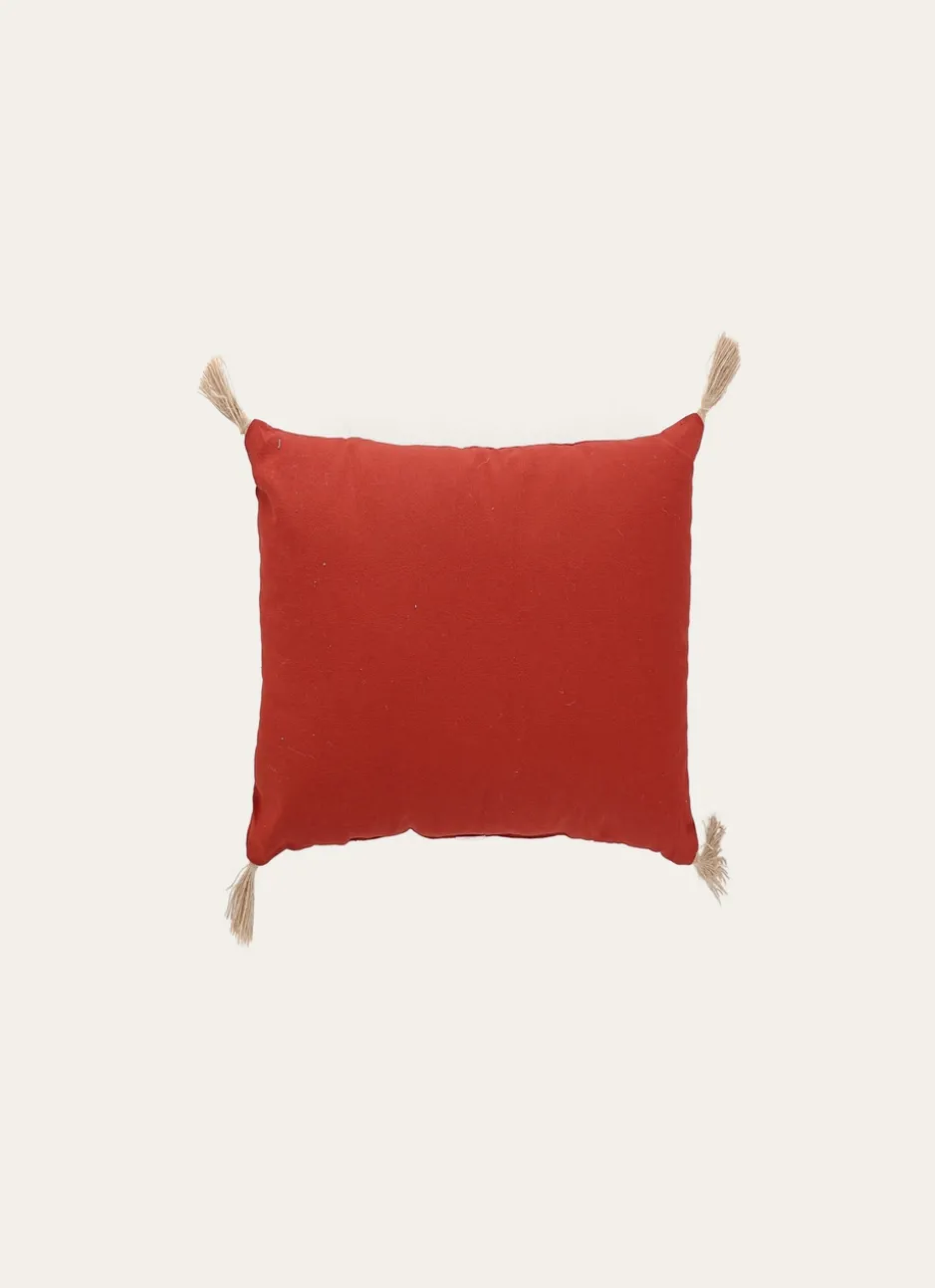 COUSSIN EN COTON UNI AVEC PETITS POMPONS ROUILLE