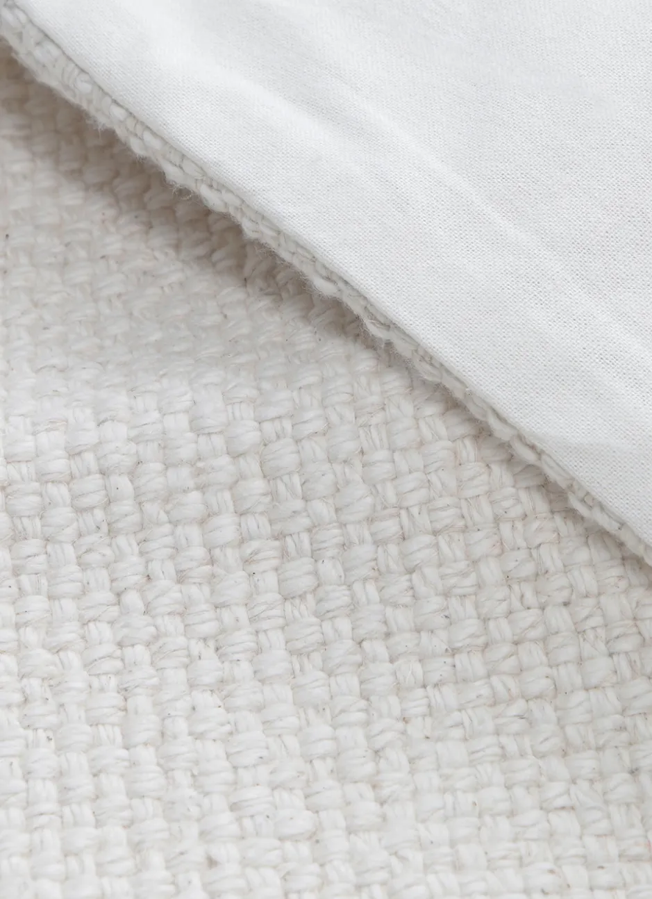 HOUSSE DE COUSSIN UNIE AVEC TISSAGE FANTAISIE ECRU