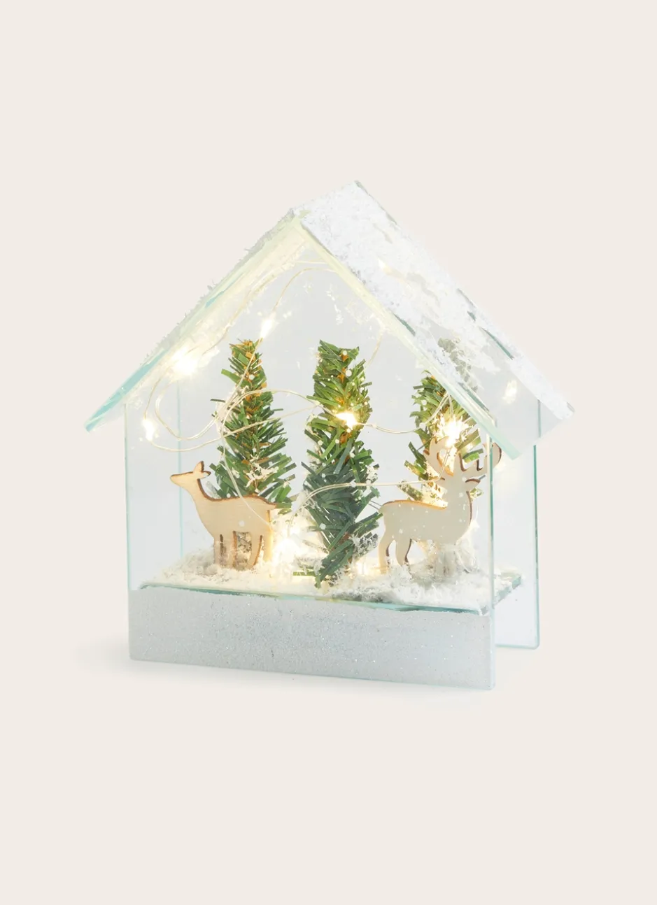 MAISON LUMINEUSE AVEC SAPIN ET CERF TRANSPARENT