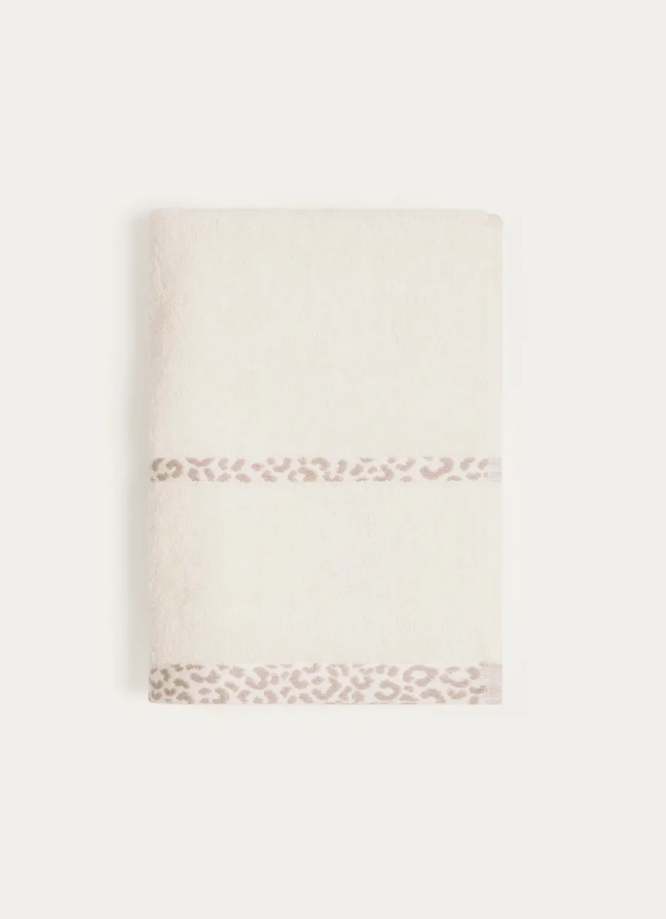 SERVIETTE DE TOILETTE UNIE AVEC LITEAU LÉOPARD BEIGE CLAIR